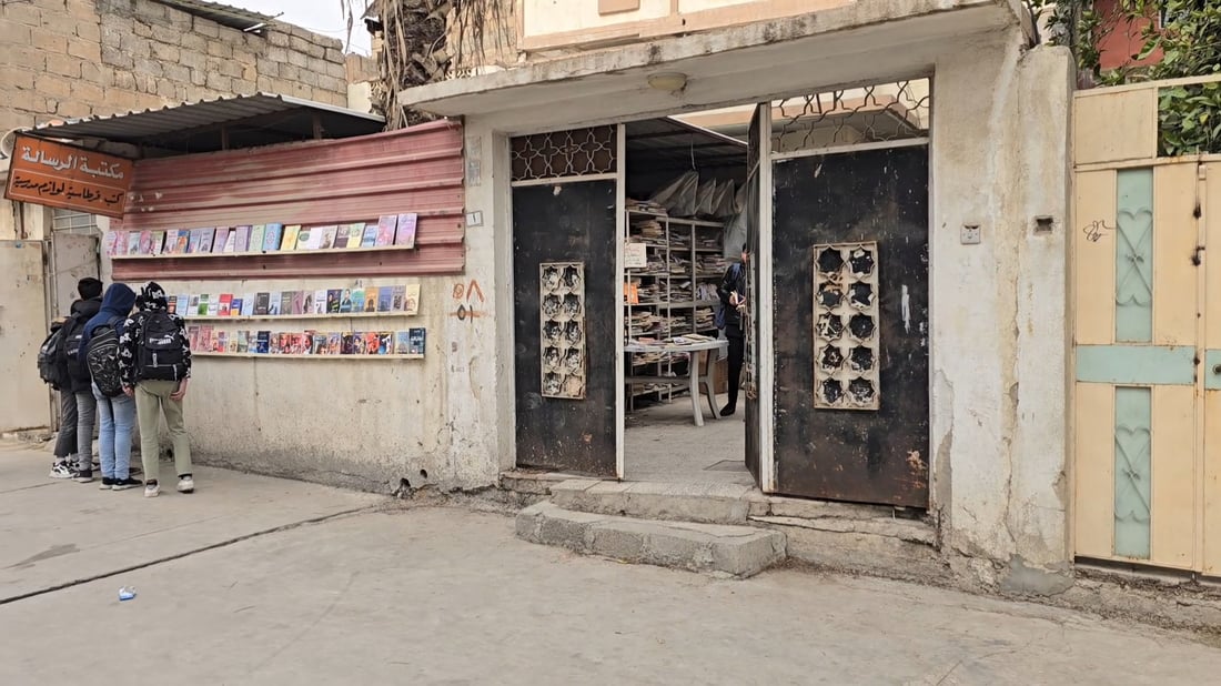 Retired librarian transforms home storage into community library in Mosul