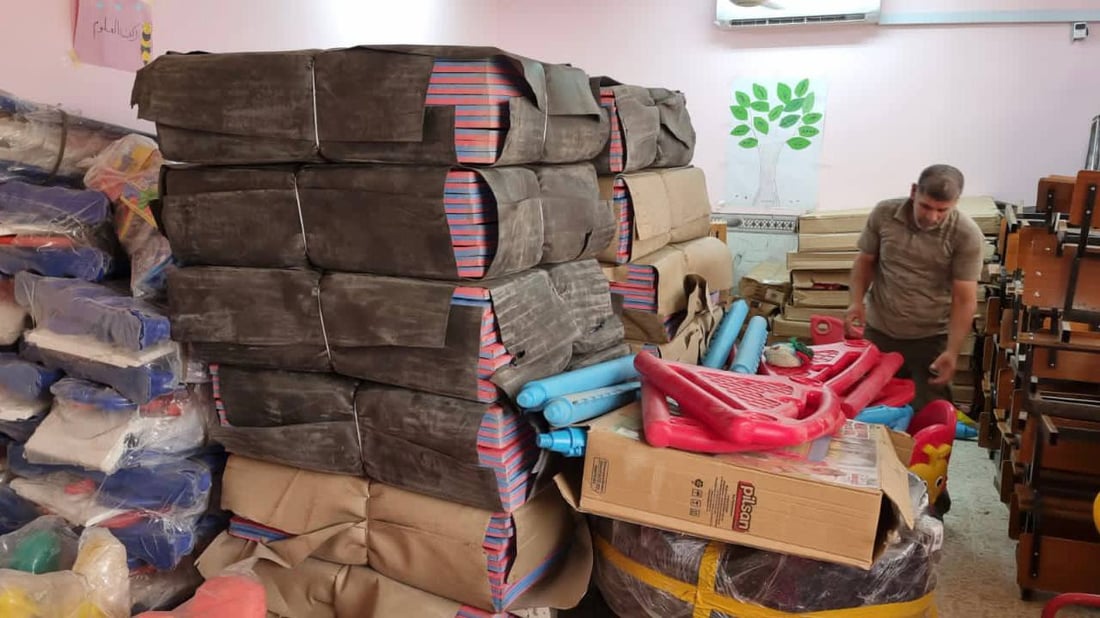 صور: عملاق النفط الروسي يوزع الألعاب على أطفال البصرة