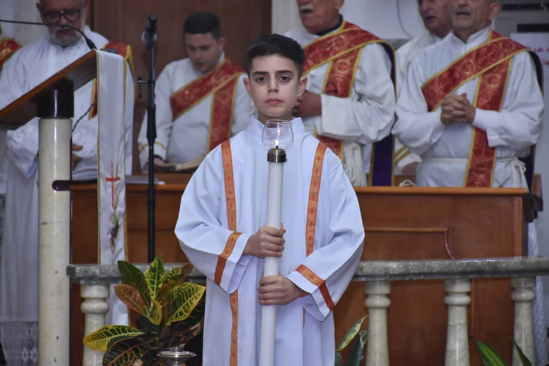 Photos: Somber Christmas Mass in Hamdaniya