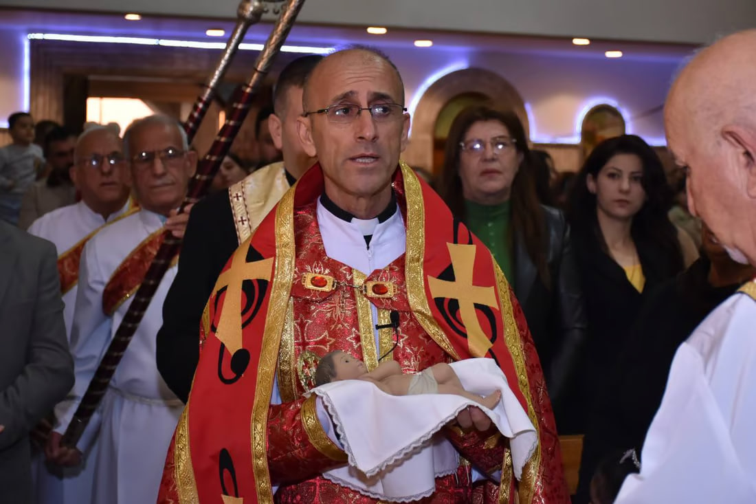 Photos: Somber Christmas Mass in Hamdaniya