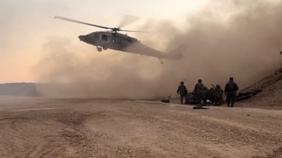 لە ناو سوریا بە فڕۆكە دابەزین و دوو كەسیان دەستگیر كرد