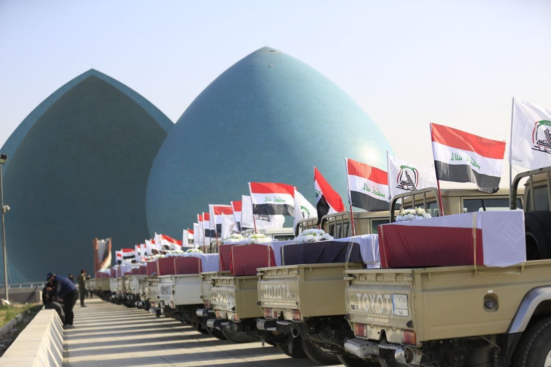 صور: الحشد يقيم تشييعاً رمزياً لضحاياه الذين سقطوا بقصف أميركي 2019