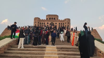 خێزانێکی گەرمیانی ئەگەر باران بهێڵێت خۆیان بۆ سەیران ئامادەکردووە