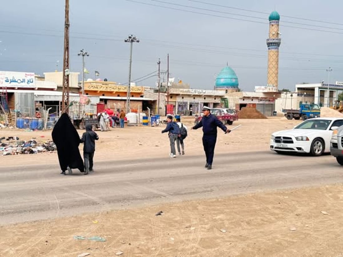 مهام جديدة لمرور واسط.. تأمين عبور التلاميذ في الشوارع القريبة من المدارس (صور)