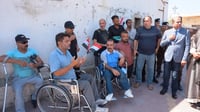 معاقو واسط أمام مكتب البرلمان: اصرفوا الـ 80 ألف دينار!
