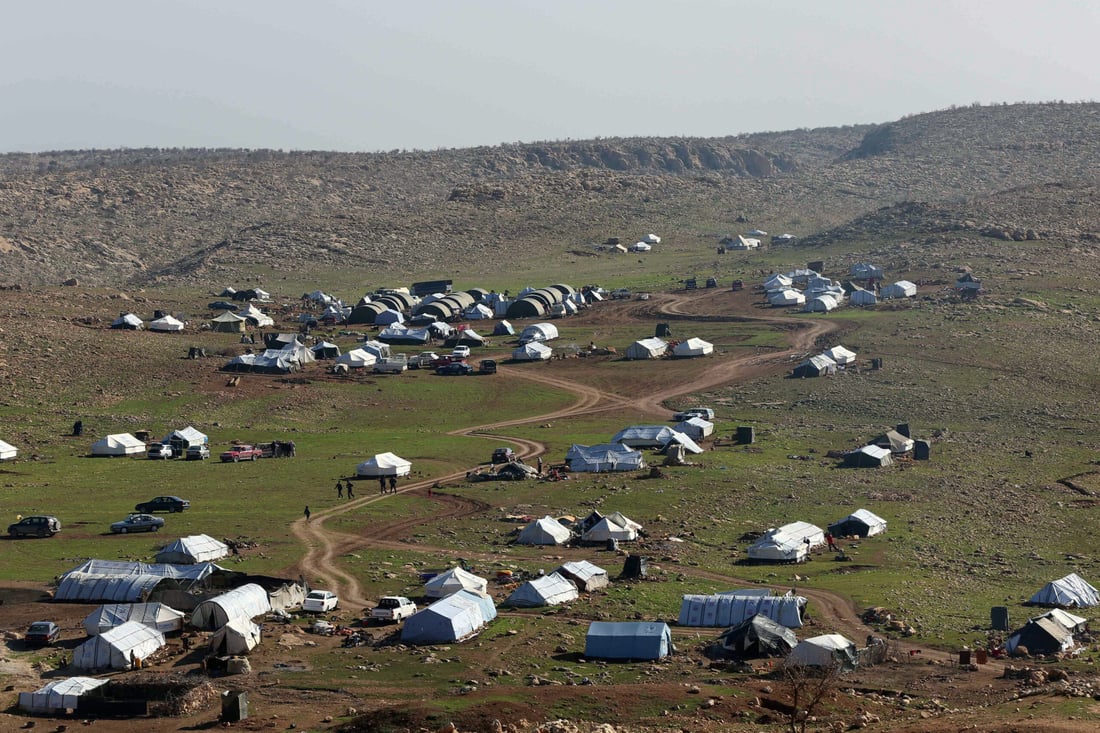 FILE PHOTO December 21, 2014 shows tents at a camp hosting displaced Iraqi from the Yazidi community set up on Mount Sinjar (Photo by Safin HAMID / AFP)
