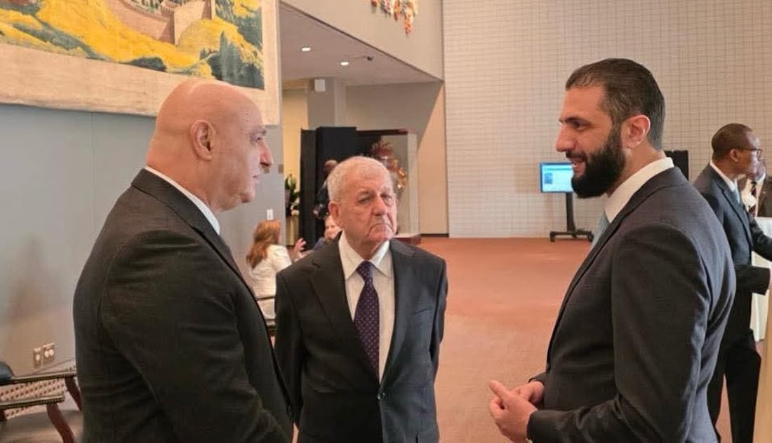 صورة: الرئيس العراقي يتأمل الحديث بين الشرع وعون