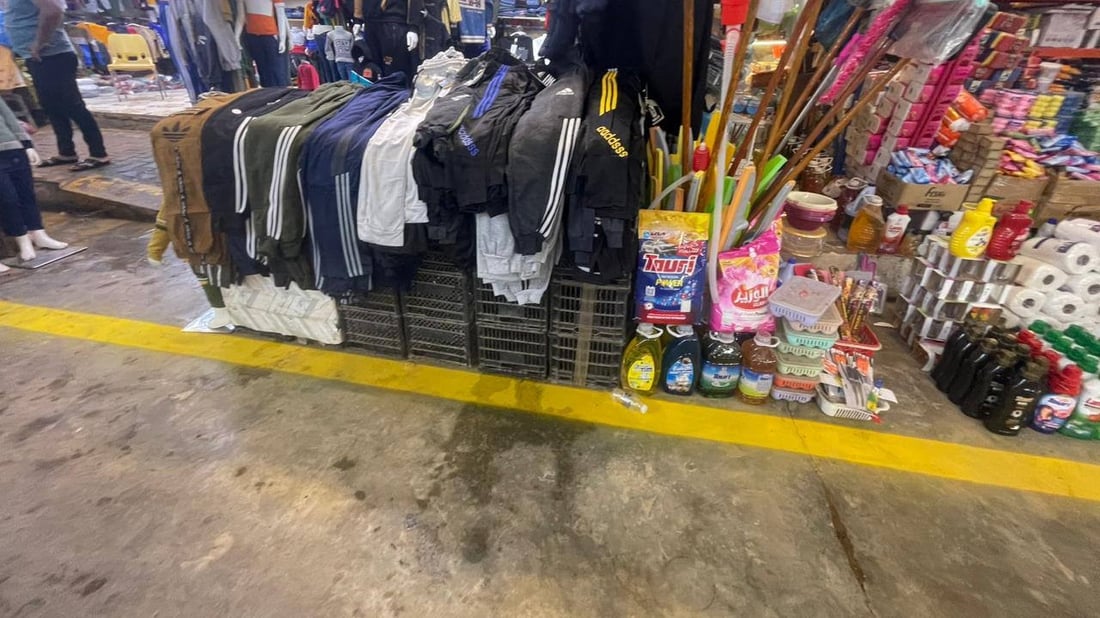 الفلوجة انتهت من ترسيم حدود سوق “النزيزة”.. لا بضائع بعد الخط الأصفر (صور) 