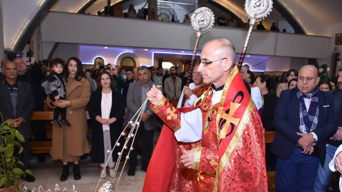 Photos: Somber Christmas Mass in Hamdaniya