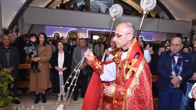 Photos: Somber Christmas Mass in Hamdaniya