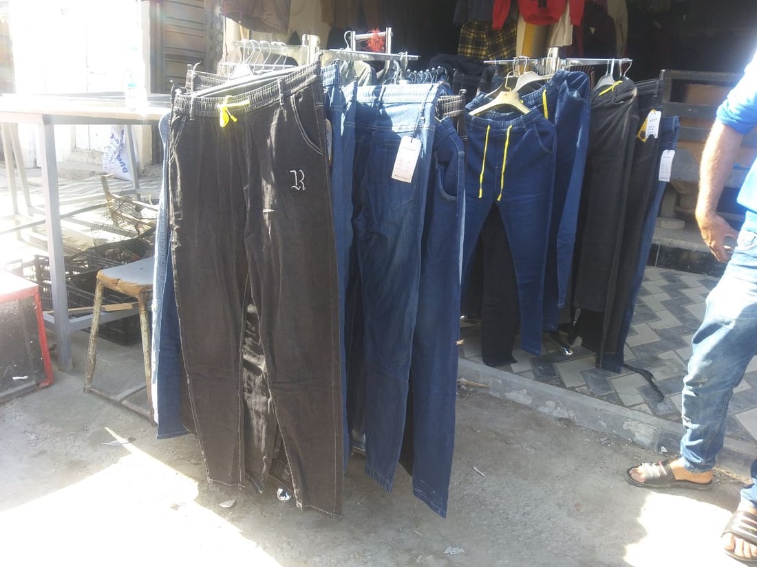 بغداد: تجارة “البالة المُنتقاة” تنتعش في سوق مدينة الحرية (صور)