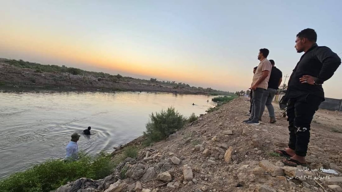 صور: غواصو سرايا السلام ينتشلون جثة طفل من نهر الديوانية