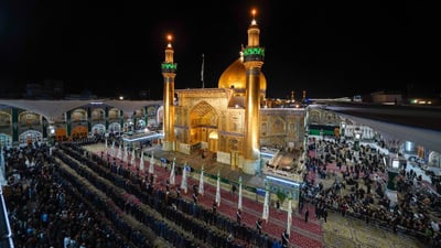 صور: العتبة العلوية تزيح الستار عن التاج الذهبي لضريح الإمام علي