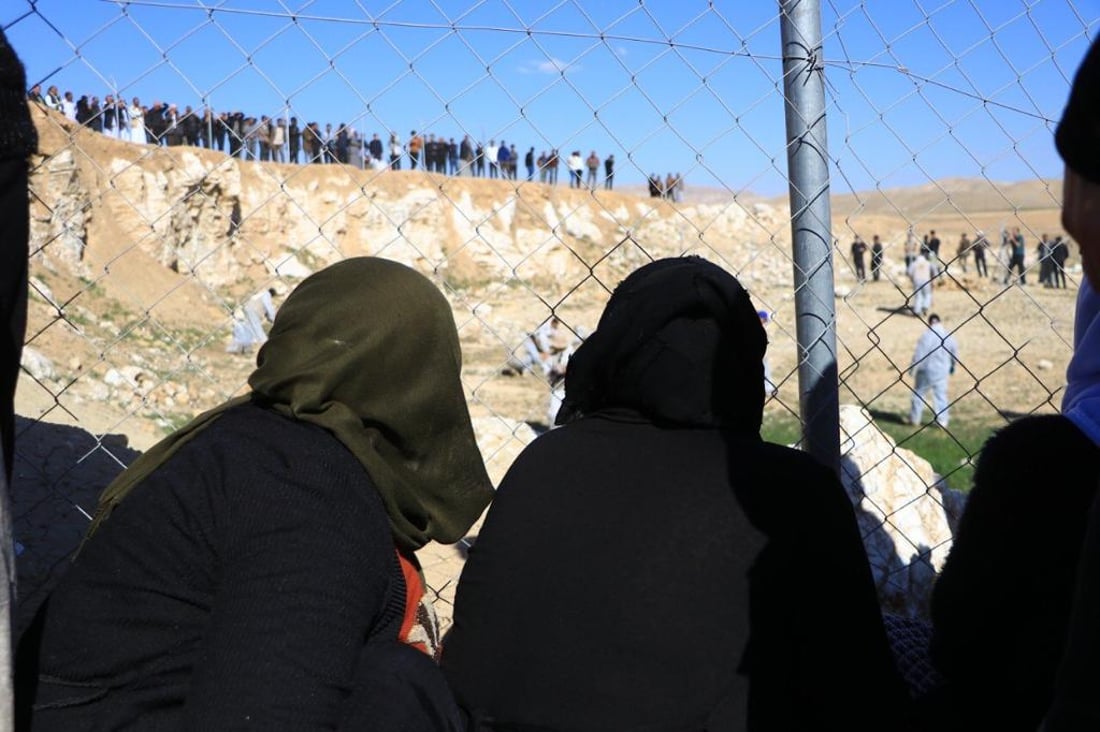 صور: شهادات مروعة من الناجين الإيزيديين خلال فتح مقبرة “زليلة” الجماعية في سنجار