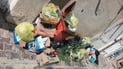 Garbage piles up in Al-Qala’a Al-Salih town as sanitation workers strike over unpaid wages