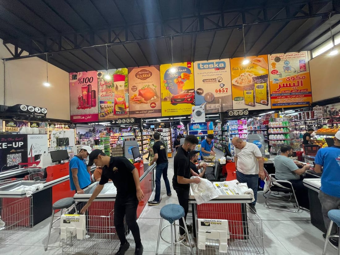 أسواق النجف تعتذر عن التعامل بالدولار والأمن الوطني يعاقب من يخالف (صور)