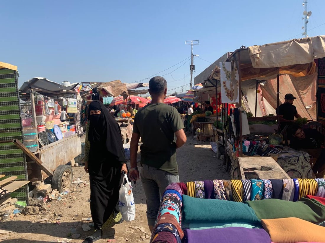 صور: بسطات أبو غريب عادت لتزاحم شركة إماراتية على شارع الشيخ ضاري