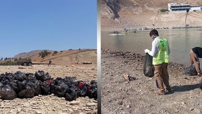 تیمەکانئ شارەوانی دەریاچەی دوكانیان لە پاشماوەی گەشتیاران پاککردەوە