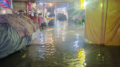 بەشێک لە دوکانەکانی بازاڕی تەیراوە ئاوی تێچووە