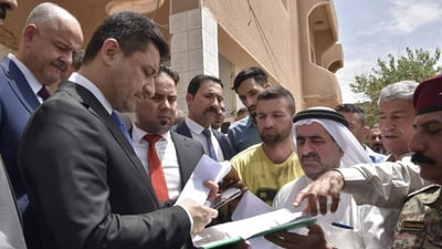 قرر إغلاق التسجيل العقاري فوراً.. فيديو من زيارة وزير العدل إلى سامراء