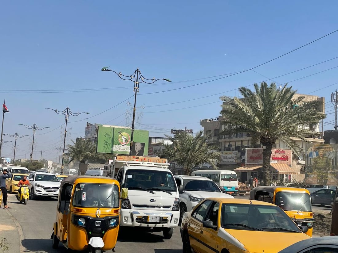 جدار القاعدة الأميركية يغادر مدخل مدينة الصدر (صور)