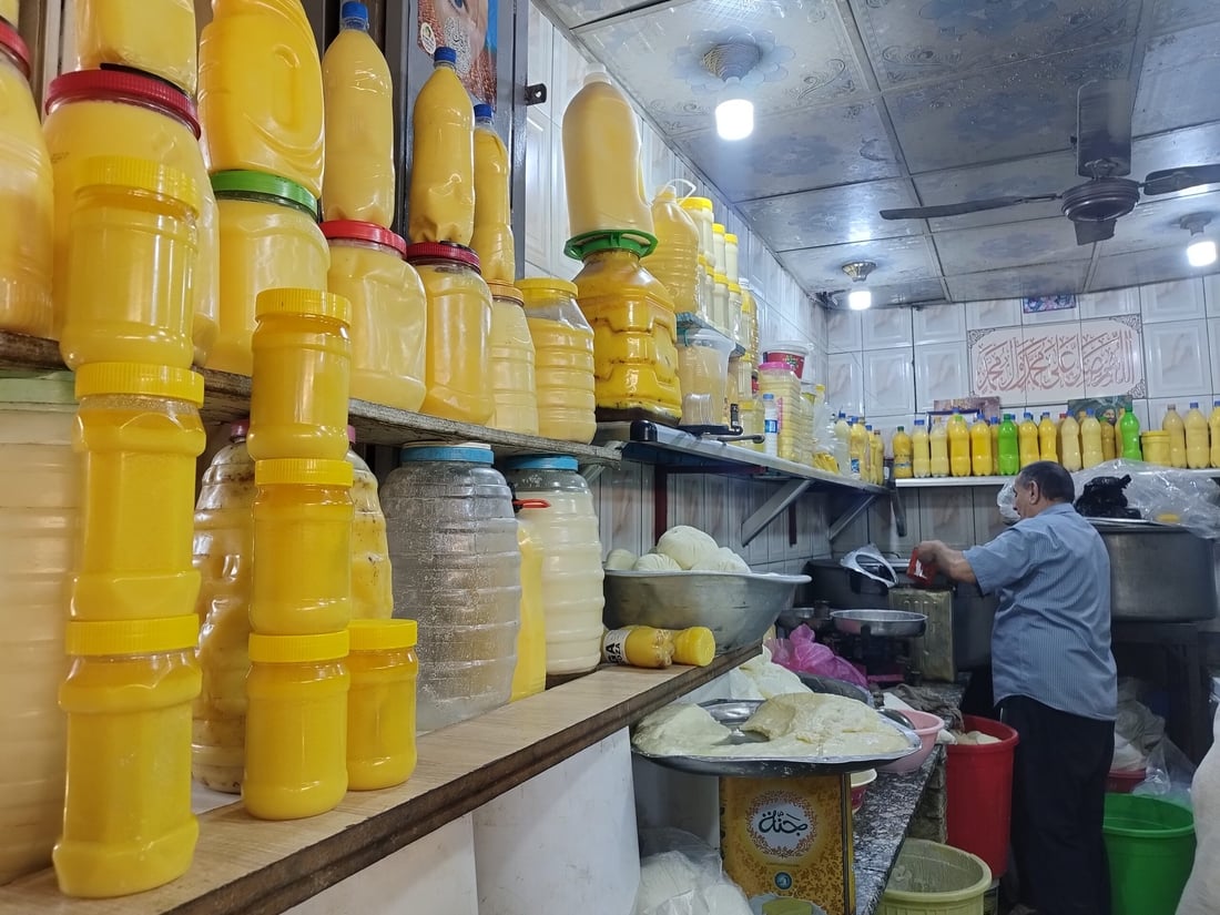 صور: رمضان في الحلة… دهن حر بـ30 ألفاً لمعالجة التمور وطبخ العنبر