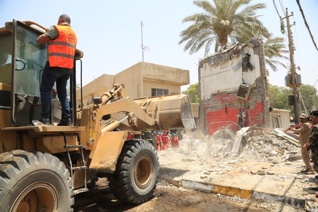 BAGHDAD, IRAQ - MAY 29: Search and rescue work continues after a powerful explosion apparently caused by a gas leak in a restaurant that blew away the two-story building in Baghdad, Iraq on May 29, 2022. (Photo by Murtadha Al-Sudani/Anadolu Agency via Getty Images)