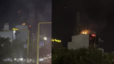 ئاگر لە باڵەخانەی چاینا تاوەر كەوتووەتەوە