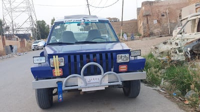 صور: حدّاد عراقي يصنع سيارة من الخردة.. “جيب” جاسم تحمل رقم تلعفر