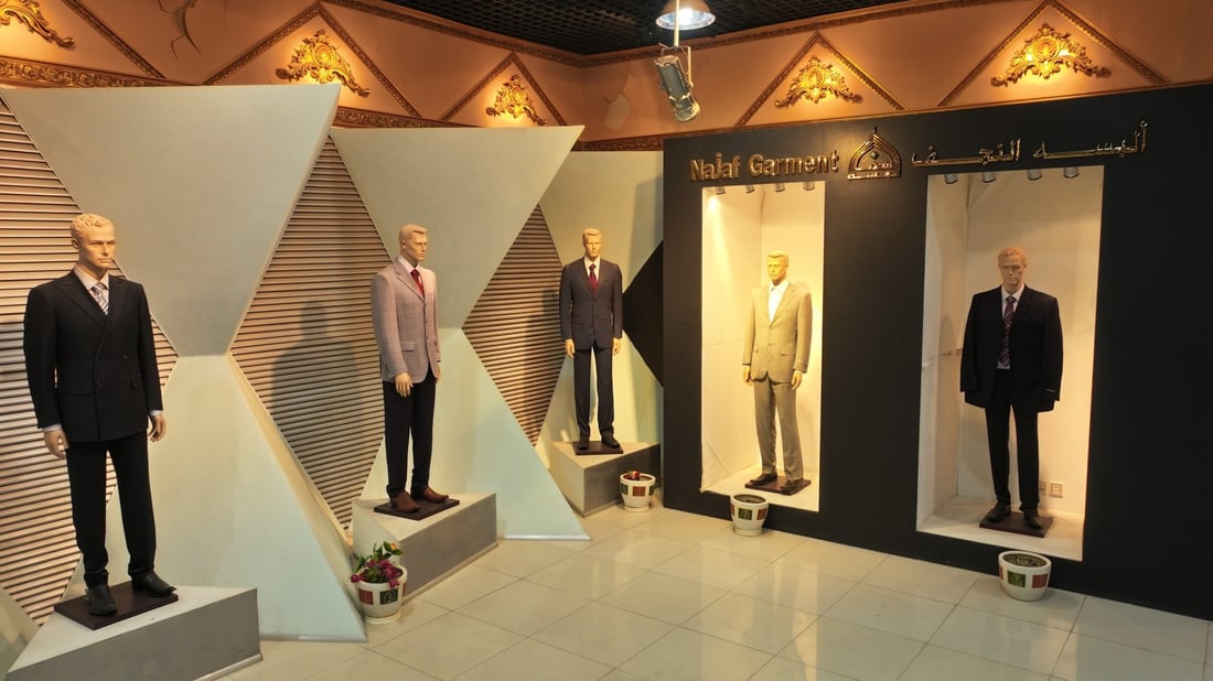 بدلات رسمية وعسكرية صنعت في العراق.. معمل النجف مستعد لرفد الدولة والسوق