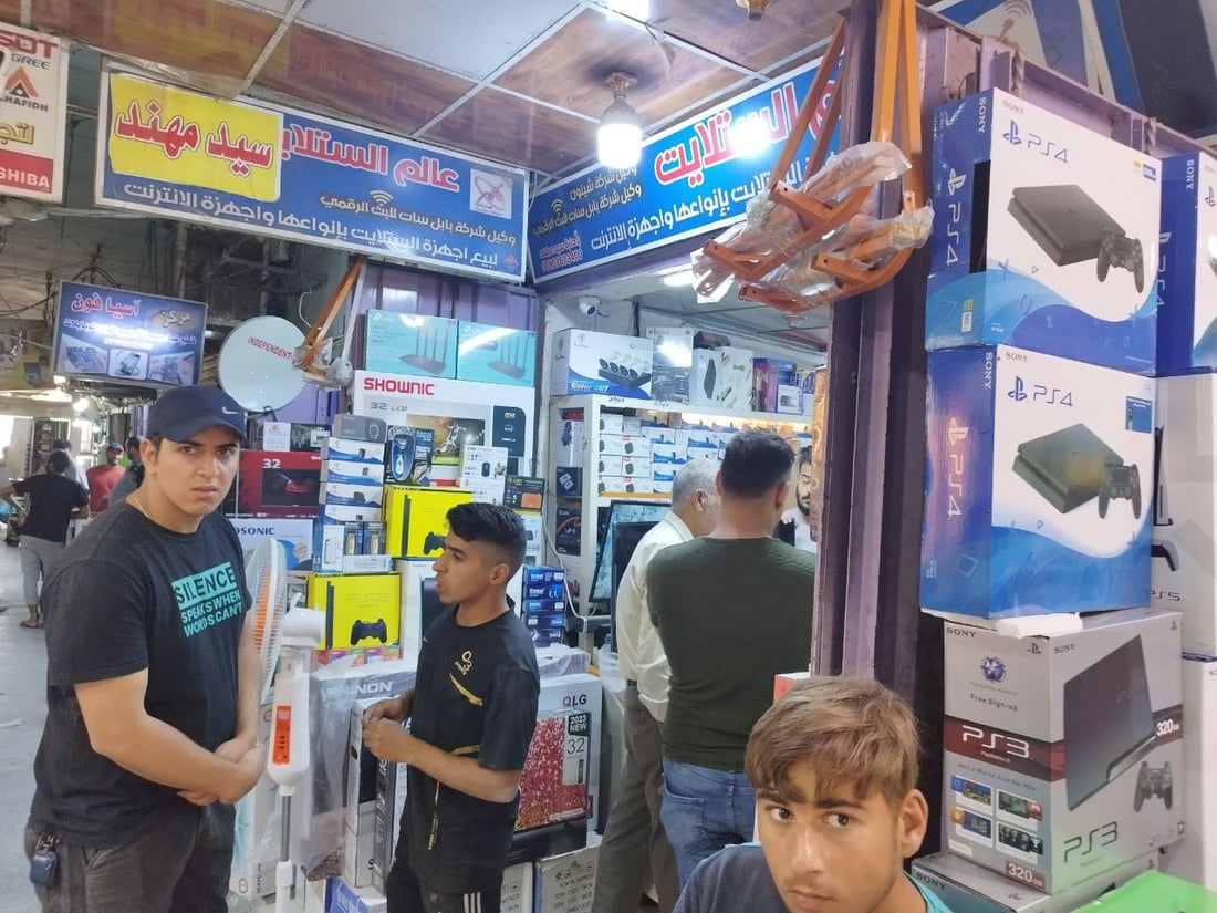 صور: ارتفاع مبيعات “PlayStation” في الحلة.. موسم الألعاب بدأ ولا حيلة للآباء