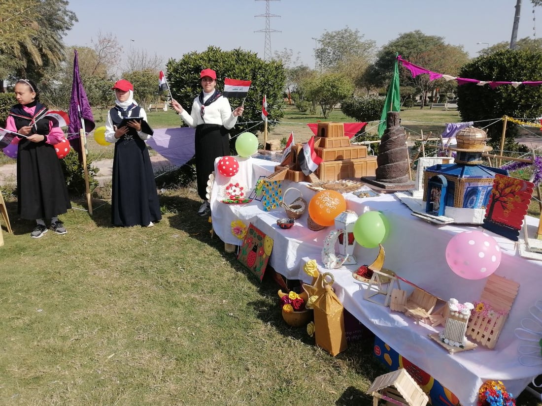 صور: صغيرات بابل يحتفلن تحت شمس الجنائن مع اللوحات والموسيقى