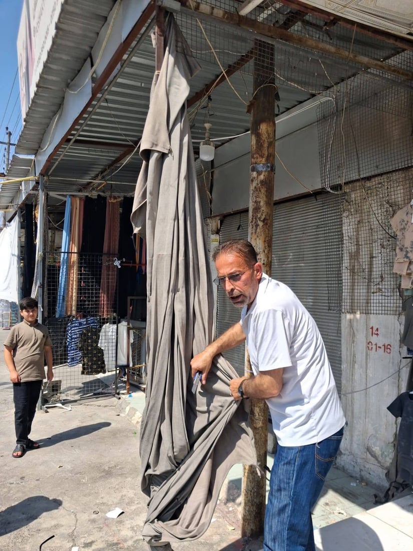 شۆستەی دوو بازاڕی هەولێر لە کەلوپەلی دوکانداران و عارەبانە پاککرایەوە