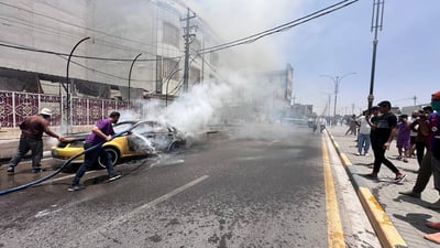 Parked car catches fire in Basra as officials blame extreme heat
