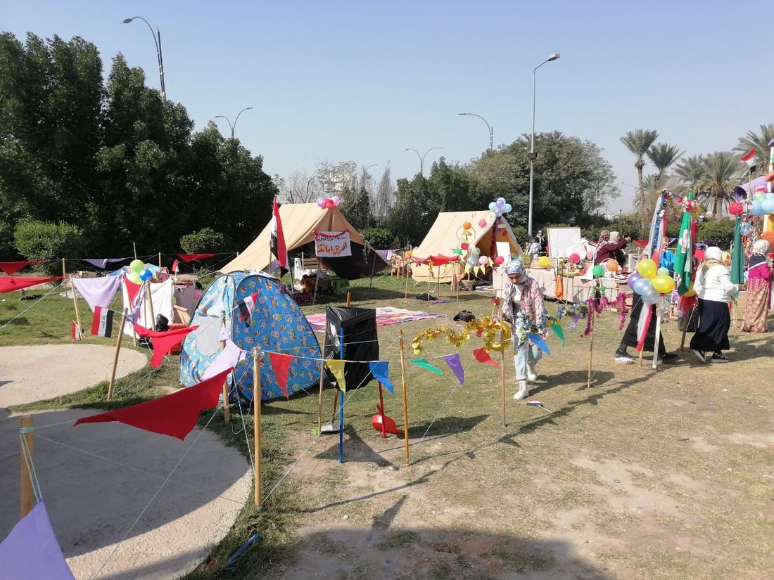 صور: صغيرات بابل يحتفلن تحت شمس الجنائن مع اللوحات والموسيقى