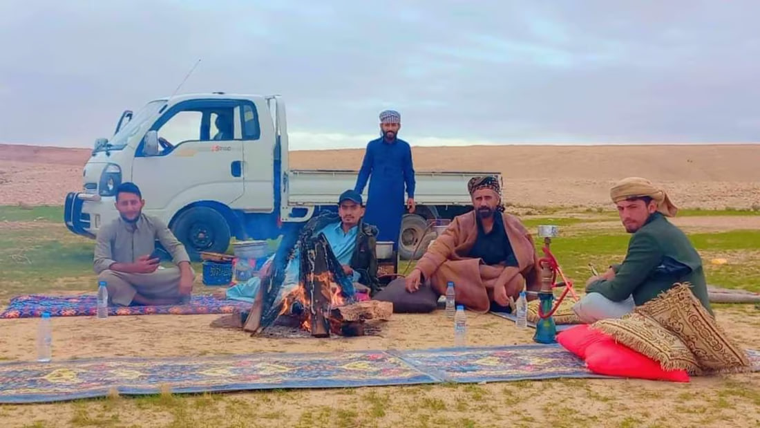 Camping enthusiasts explore the scenic Iraqi desert in Samawah
