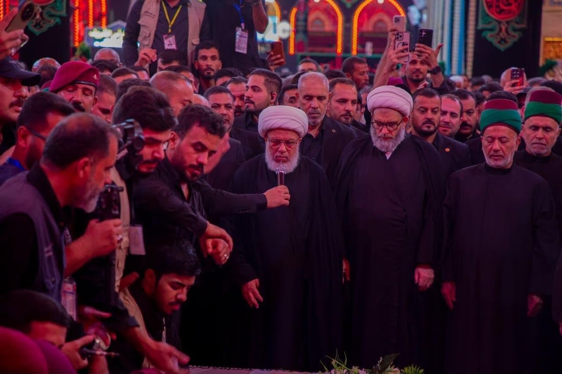 صور: ممثل المرجع السيستاني يصلي على ضحايا الحشد الشعبي