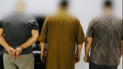 سێ پیاوی زەبەلاح هەڕەشەیان لە کچێک کردووە و پارەیان لێ سەندووە؛ قۆڵبەست کران