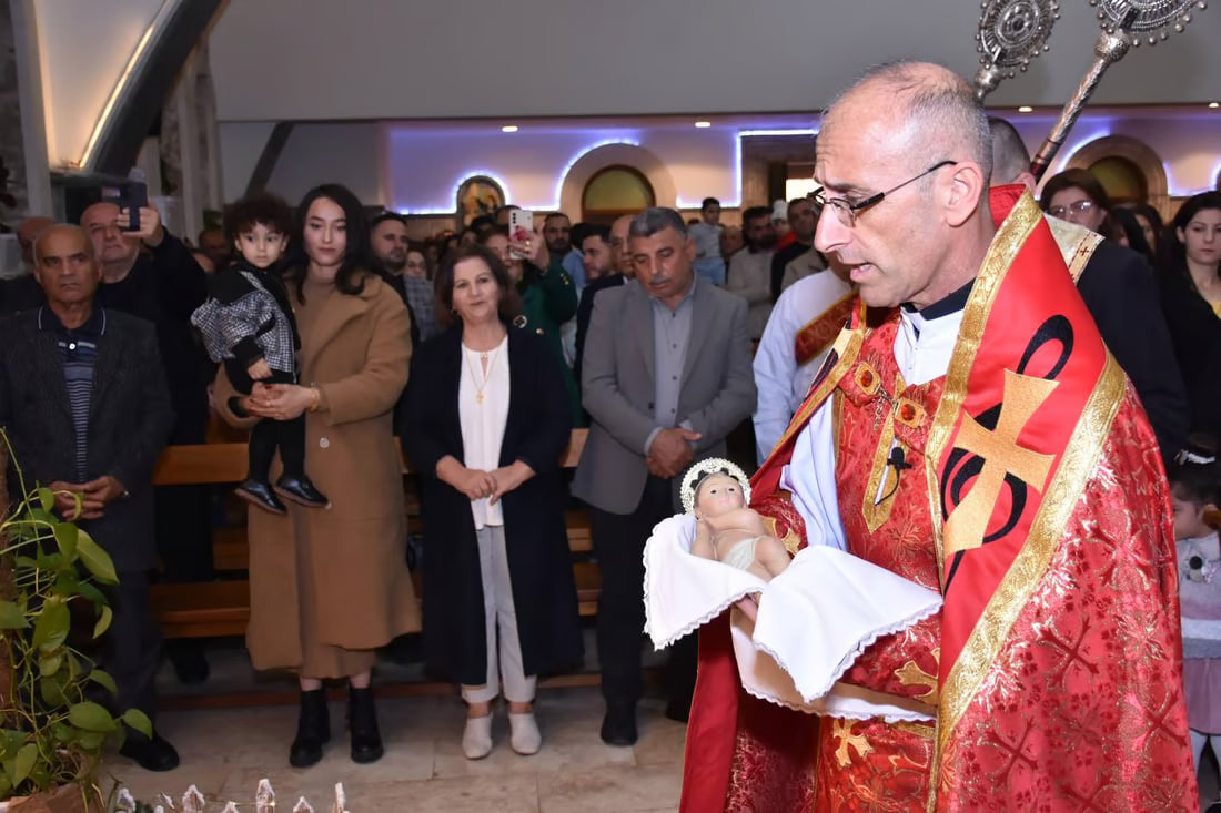 Photos: Somber Christmas Mass in Hamdaniya