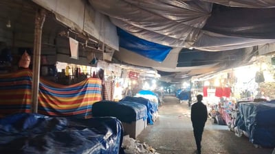 بۆ پاراستنیان لە ئاگر؛ شارەوانی هەولێر پەردەی بەردەم دوکانەکانی لادەبات