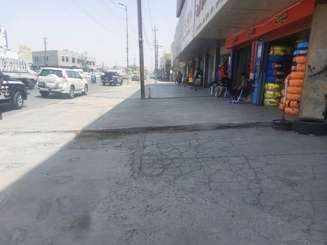 عادت الإطارات إلى داخل المحلات والرصيف أصبح واسعاً.. صور من شارع مشن في الكرادة