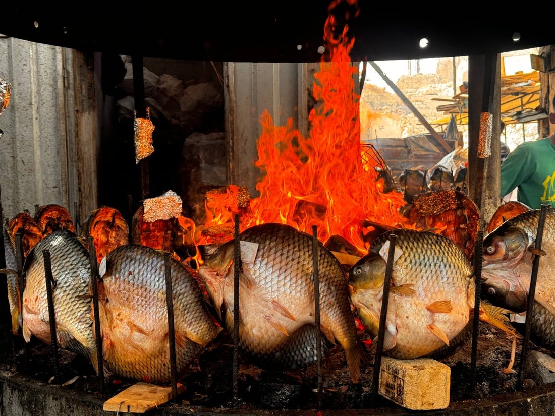 سوق السمك في الموصل ينتعش.. زوار أجانب يتوافدون يومياً (صور)