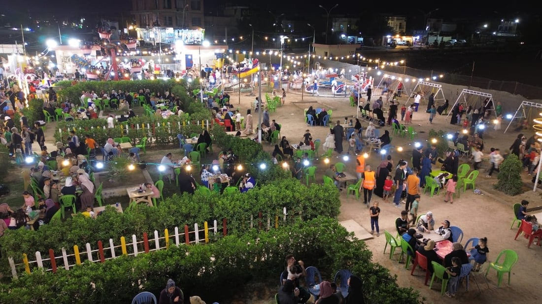 صور: العيد ليلاً في المحمودية.. لا نذهب إلى بغداد كثيراً فالمتنزهات “تتطور وتتطور”