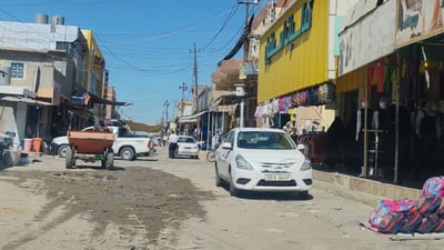 لە بازاڕێکی خورماتوو دوکانداران رێگرن لە ئەنجامدانی پڕۆژەیەکی خزمەتگوزاری