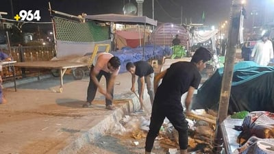 Kufa residents rally to clear trash piles near Al-Sahla mosque