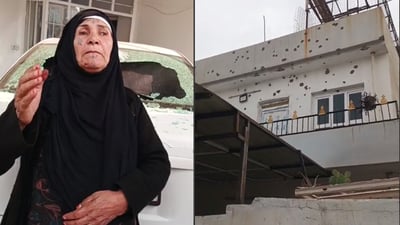 پاسەوانانى پەرلەمانتارێک ماڵێک دەدەنە بەر گولـلە