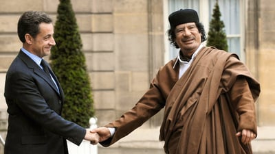 قەزافى لە ژیاندا نەماوە کەچى سارکۆزى خستە زیندانەوە