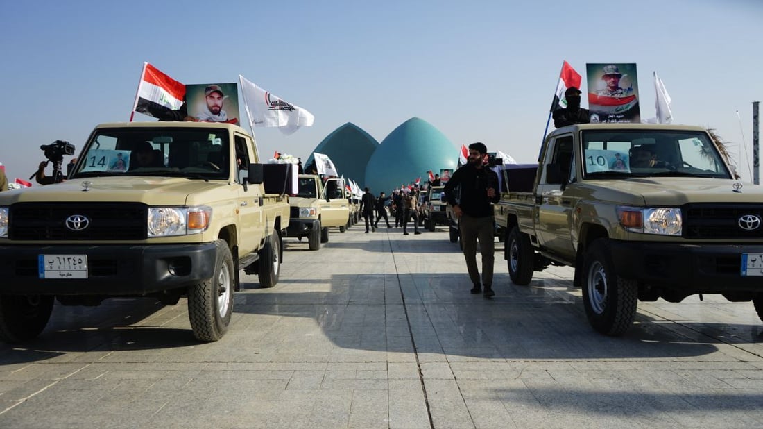 صور: الحشد يقيم تشييعاً رمزياً لضحاياه الذين سقطوا بقصف أميركي 2019