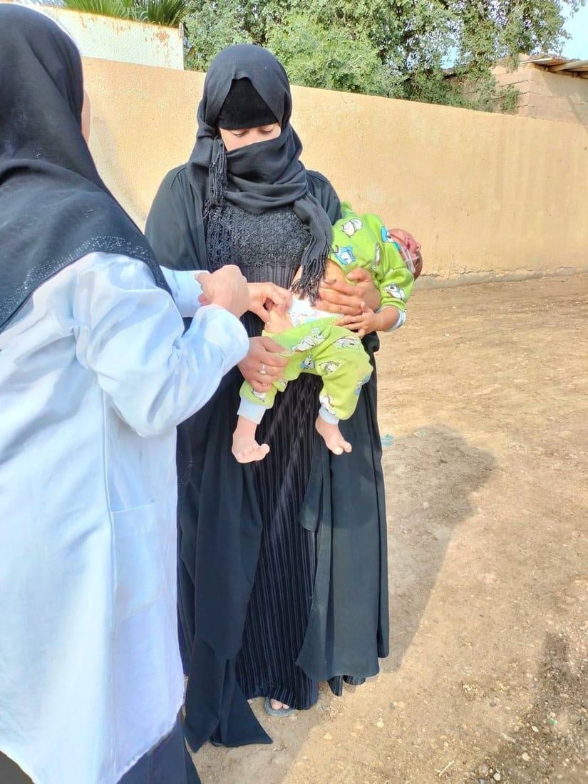 صور: اللقاحات تصل إلى أطفال ميسان في القرى البعيدة