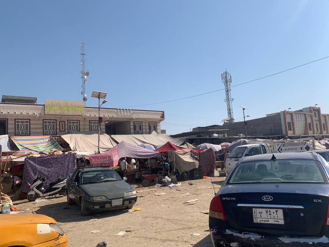 صور: بسطات أبو غريب عادت لتزاحم شركة إماراتية على شارع الشيخ ضاري